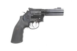 A Smith and Weston model 586 co2 powered air pistol. .