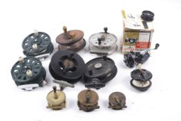 Eleven vintage fishing reels.