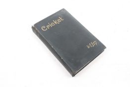 A signed copy of 'Cricket' by WG Grace.