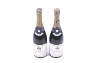 Two bottles of Cuvee de Reserve 1943 champagne. In 75cl bottles but no qty or vol shown.