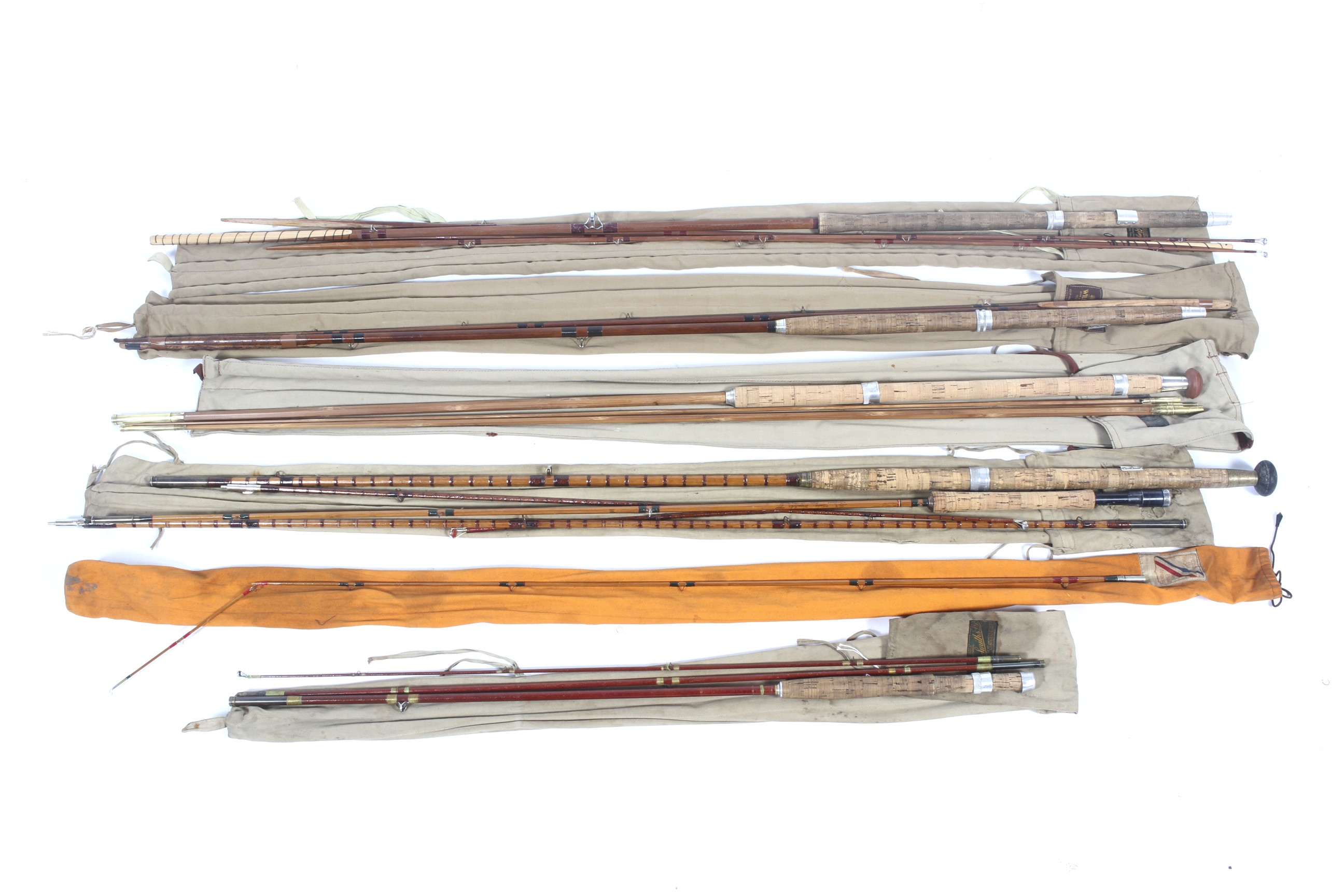 Seven vintage salmon and trout fly rods.