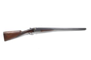 An AYA side by side 12 gauge shotgun.