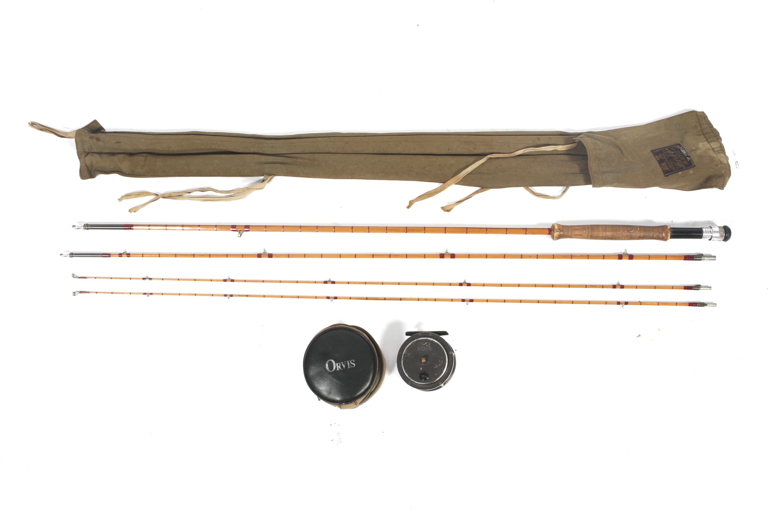 A Hardy 'The Gold Medal' 3-piece Palakona split-cane trout fly fishing rod and reels.