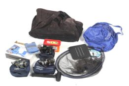 A Coarse fishing tackle bag and contents.