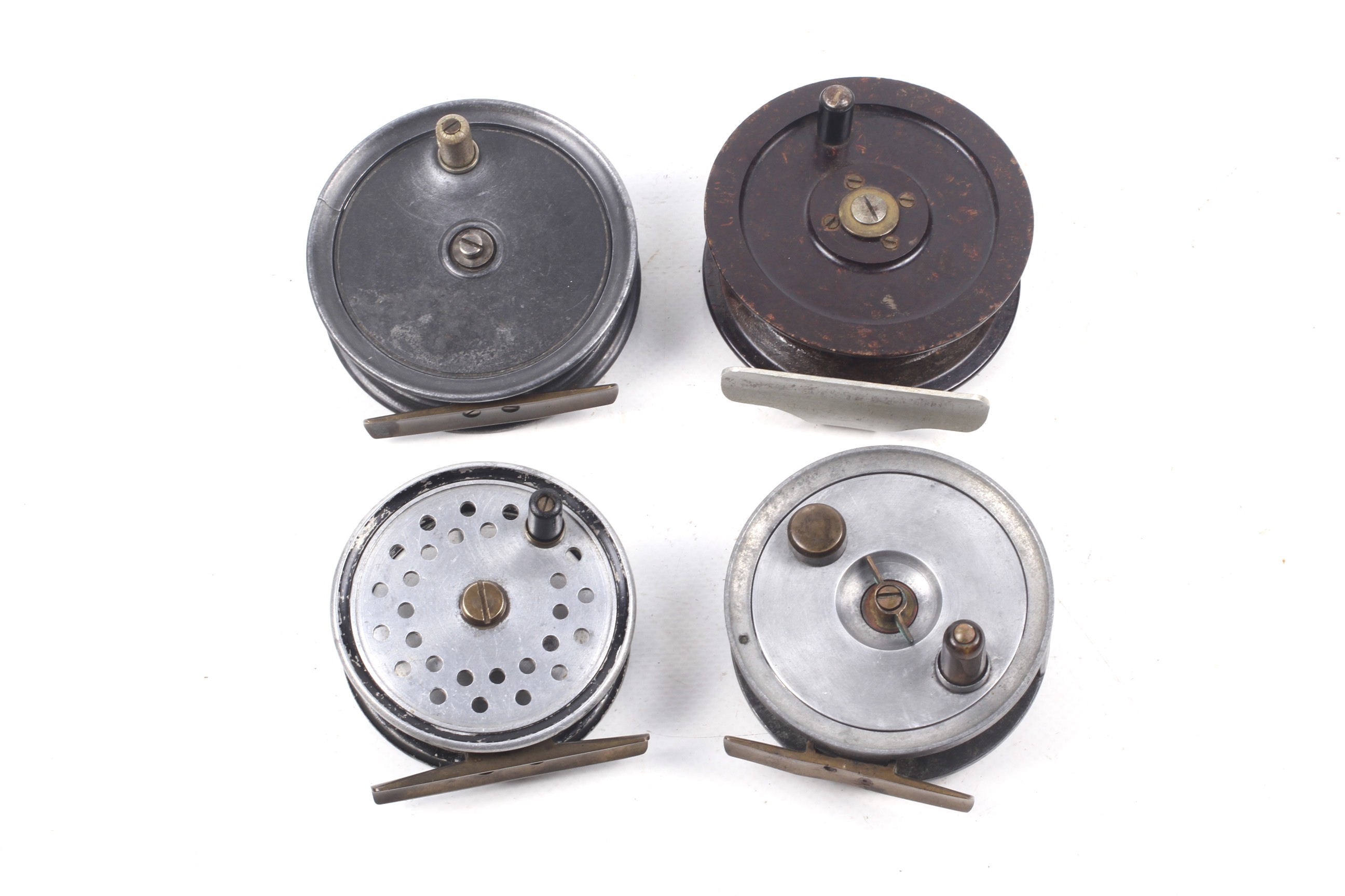Four antique fly fishing reels. Including a R.C. Moore of Belfast, 3.