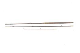 A Foster Bros of Ashbourne three section fly fishing rod. Bound in leather with brass connections.