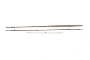 A Foster Bros of Ashbourne three section fly fishing rod. Bound in leather with brass connections.