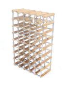A metal framed pine wine rack. With capacity for 50 bottles, H80cm x W52cm.