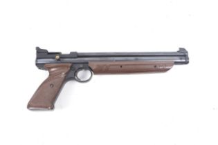 A Crossman pneumatic air pistol. .