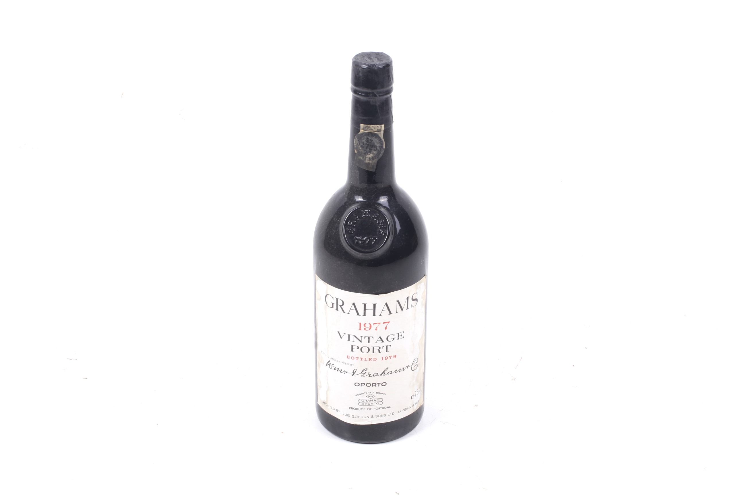 A bottle of Grahams 1977 vintage port. Bottled 1979, 75cl, no vol shown.