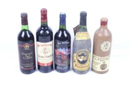 Five bottles of red wine. Including a bottle of Roc De Lussac 2005, 75cl, 13.