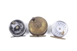 Three vintage fishing fly reels. Comprising a Farlows of London 3" trout reel, no. A7170, a A.C.