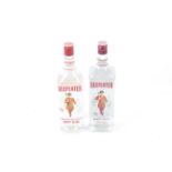 Two bottles of Beefeater gin. one bottle contains 1l, 40% vol, the second 1.14l, 47% vol.