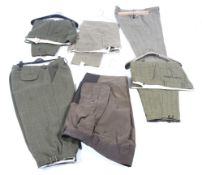 Six pairs of gentleman's tweed and outdoor trousers. In various styles and sizes.