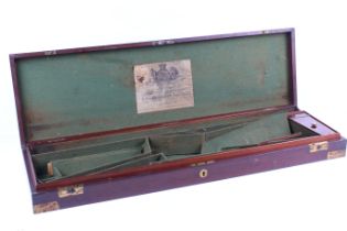 A John Manton and Son mahogany and brass gun case.