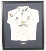 A Gloucestershire Cricket Club signed shirt.