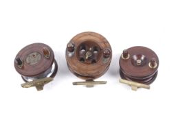 Three vintage wooden reels. All unbranded, including a 3.5" strapback reel and a 3.