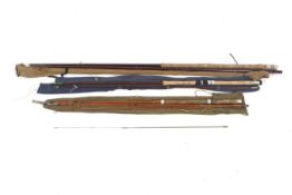 Three vintage coarse fishing rods.