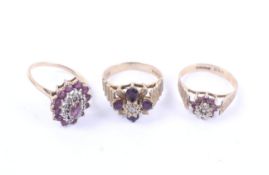 Three vintage 9ct gold, ruby and diamond cluster rings.