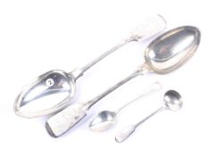 A pair of early Victorian silver fiddle pattern table spoons and two other small spoons.