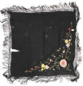 A 20th century black silk shawl.