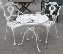 A brand new solid cast aluminium bistro set in old English white powder coating.