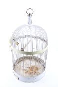 A vintage metal bird cage.
