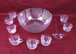 A French mid century Arcoroc punch bowl set. Including eight cups and a ladle.