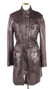 A ladies vintage brown leather coat.