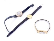 Three lady's 9ct gold cased wristwatches.