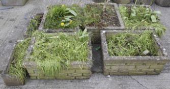 Five large reconstituted stone troughs and two smaller troughs. Max. H30cm. (7).