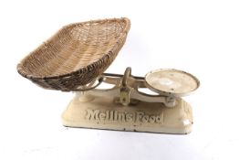 A set of vintage Mellin's Food baby weighing balance scales.