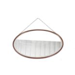 oval wall hanging mirror plus leather and canvas case.