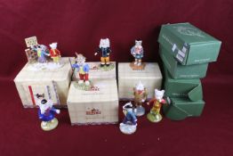 Collection of eight assorted Rupert the Bear figures.