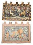 Two wall hanging tapestries.