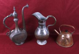 A collection of three assorted vintage metalware items.