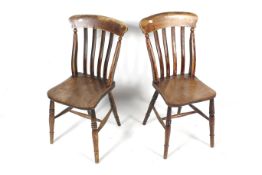 Two 19th century elm seated chairs.