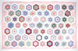 A 20th century patchwork quilt.