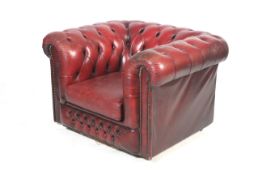 An ox blood Chesterfield club chair by Old Mill Furniture.