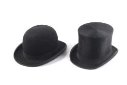 A vintage top hat and a bowler hat.
