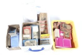 A large collection of assorted vintage and modern Ordnance Survey OS maps.