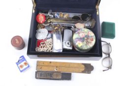 A mahogany box containing a variety of collectables.