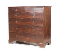 A large antique mahogany chest of drawers.