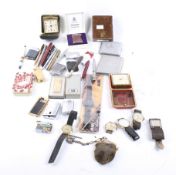 Collection of assorted watches, pens, cigarette lighters.