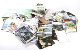 A large collection of assorted postcards and five modern albums.