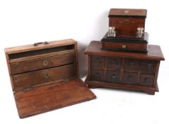 A vintage engineers tool box, letter rack and a tabletop kitchen cabinet.