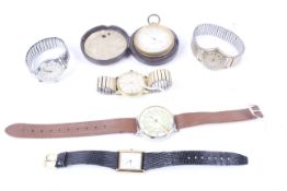 A collection of wrist and bracelet watches and a pocket compensated barometer.