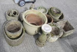 A collection of assorted garden pots and ornaments.