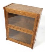 A small Globe Wernicke style two section bookcase. With glazed liftable front.