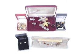 A collection of costume jewellery including a George V .500 standard silver 3 penny piece bracelet.